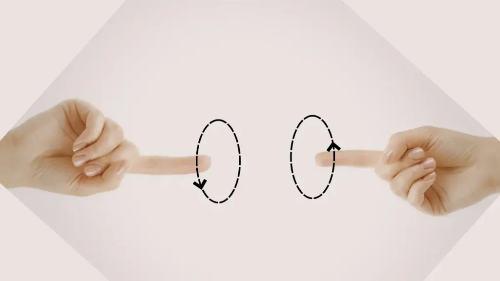 Two hands point index fingers towards each other while dotted circles indicate circling in opposite directions for this quick brain break.