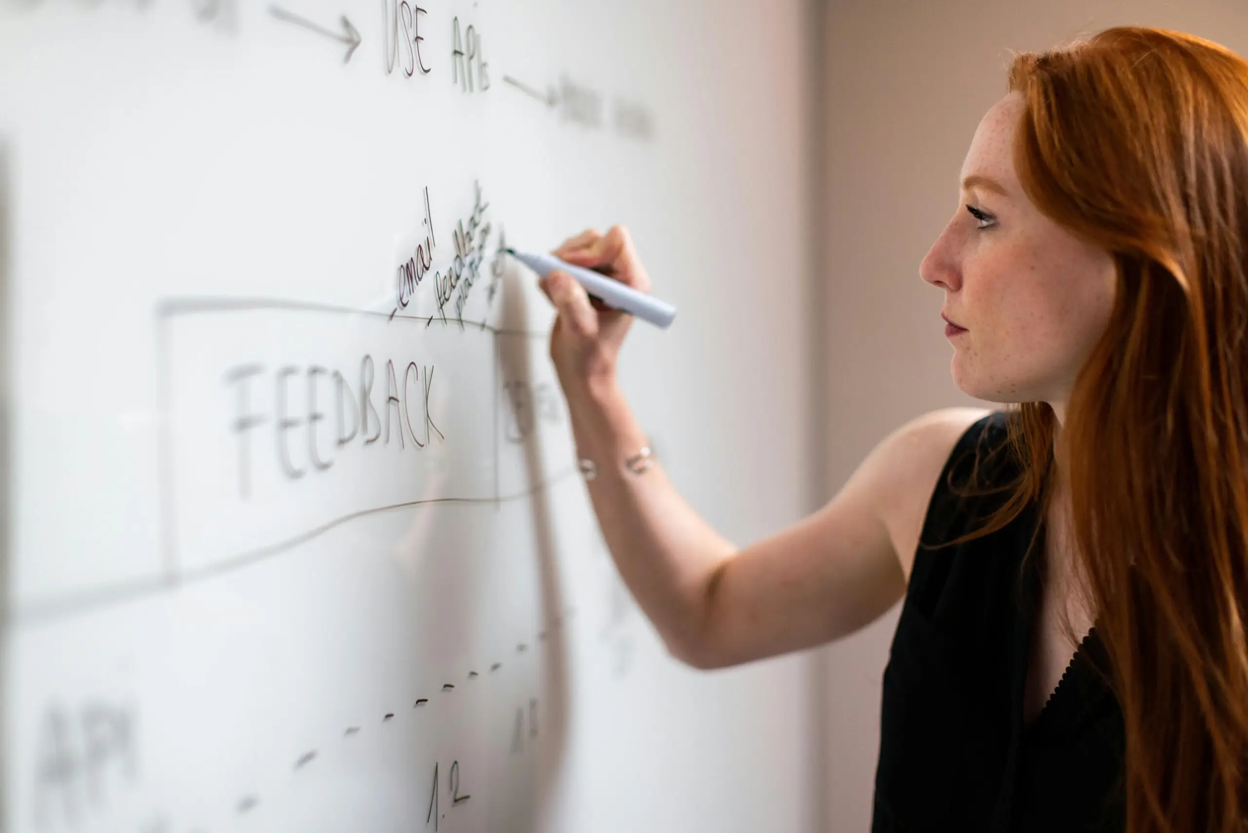 A teacher records notes on a whiteboard, showcasing Tori's love of diagramming sentences for fun