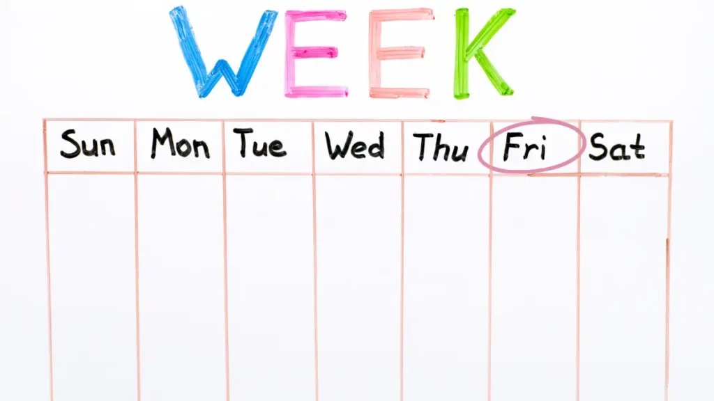 A handwritten week schedule starting on Sunday and ending on Saturday with Friday circled in pink