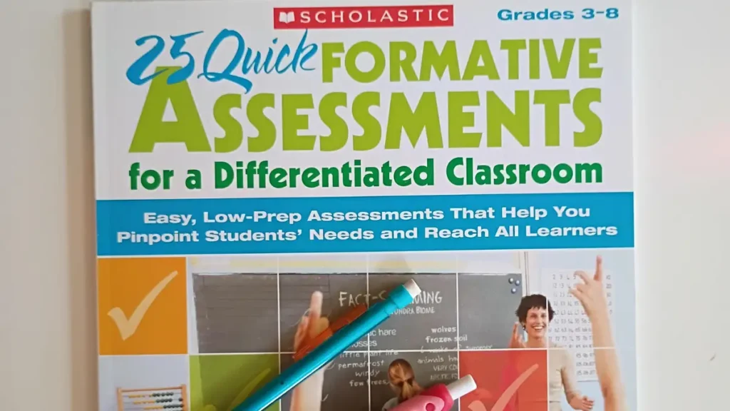 The cover of the book 25 Quick Formative Assessments for a Differentiated Classroom with a pencil and red pen along the edge
