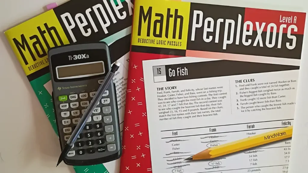 Two Math Perplexors books, a calculator, and a mechanical pencil